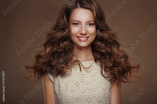 Beautiful Happy Brunette with Long Curly Hairs