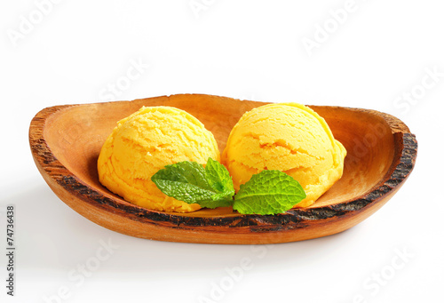 Ice cream served in natural wood bowl