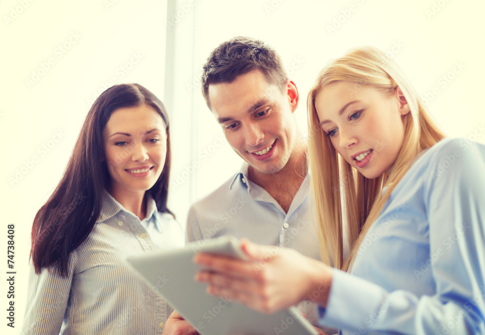 business team working with tablet pc in office business team working with tablet pc in office