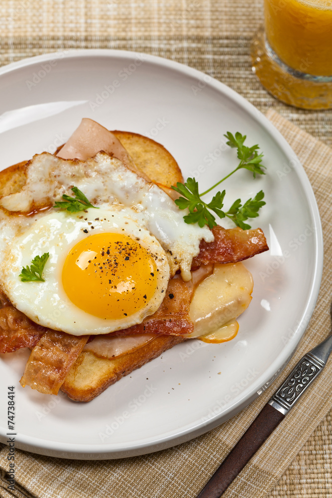 French breakfast toast with fried eggs. Selective focus. French breakfast toast with fried eggs. Selective focus.