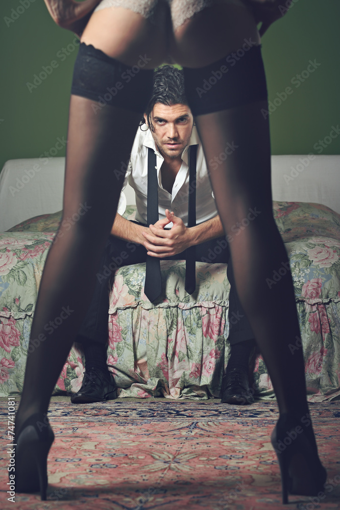 Ταπετσαρία Elegant man portrait with sensual woman legs
