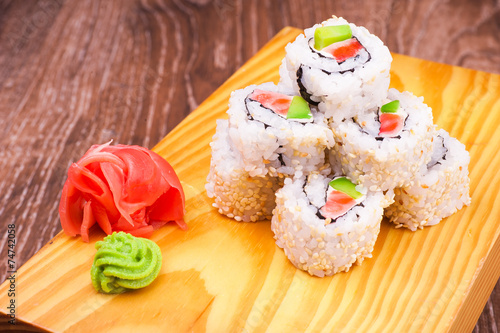 inside out sushi roll with salmon and avocado