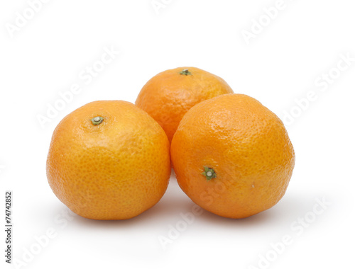 three tangerines on white background