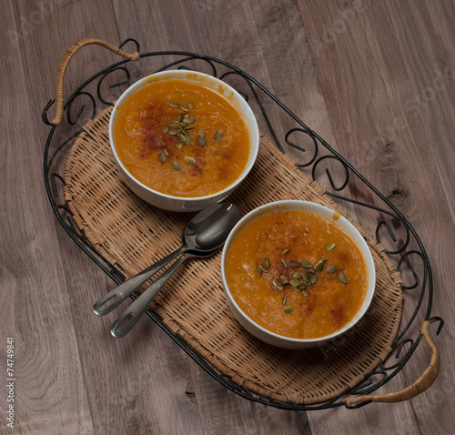 Pumkin Soup with Seeds and Paprika on Vintage Tray