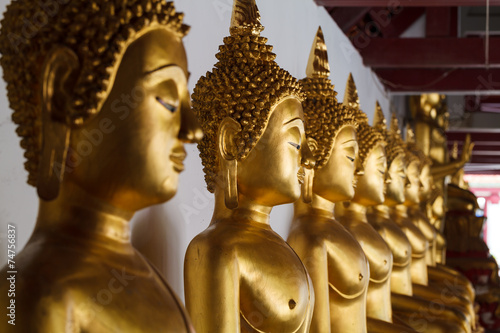 golden buddha image close-up, selective focus..