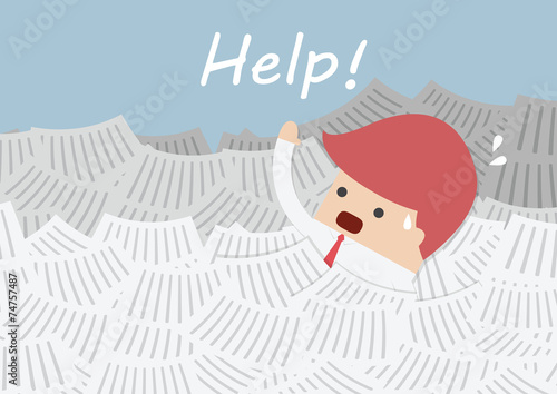 Businessman under a lot of document