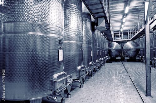 Stainless steel fermenters for wine, toned photo
