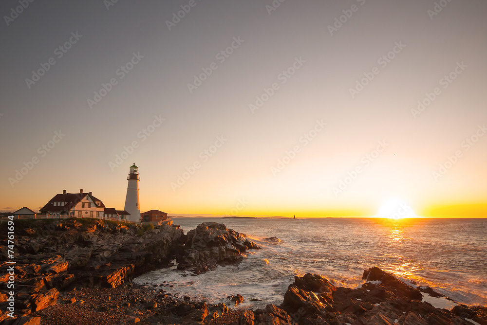 Portland Head Lighthouse at Fort Williams, Maine at sunrise over