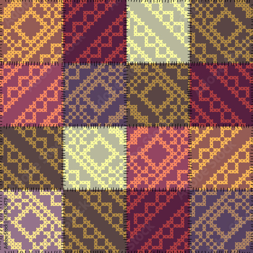 Patchwork pattern with the decorative embroidery.