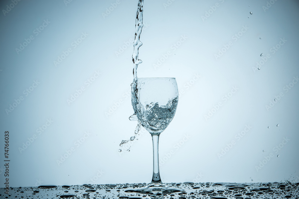 glass being filled with water