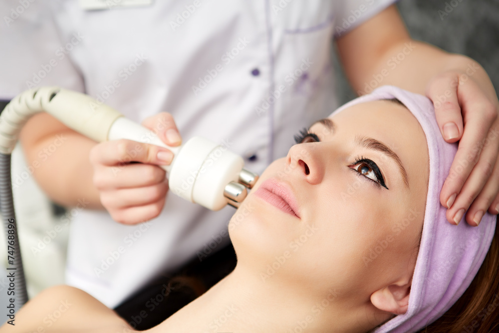 woman face treatment in medical spa center woman face treatment in medical spa center