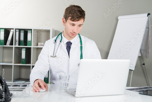 doctor at laptop