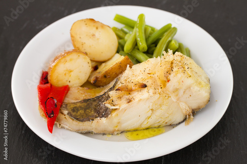 fish with vegetables on plate