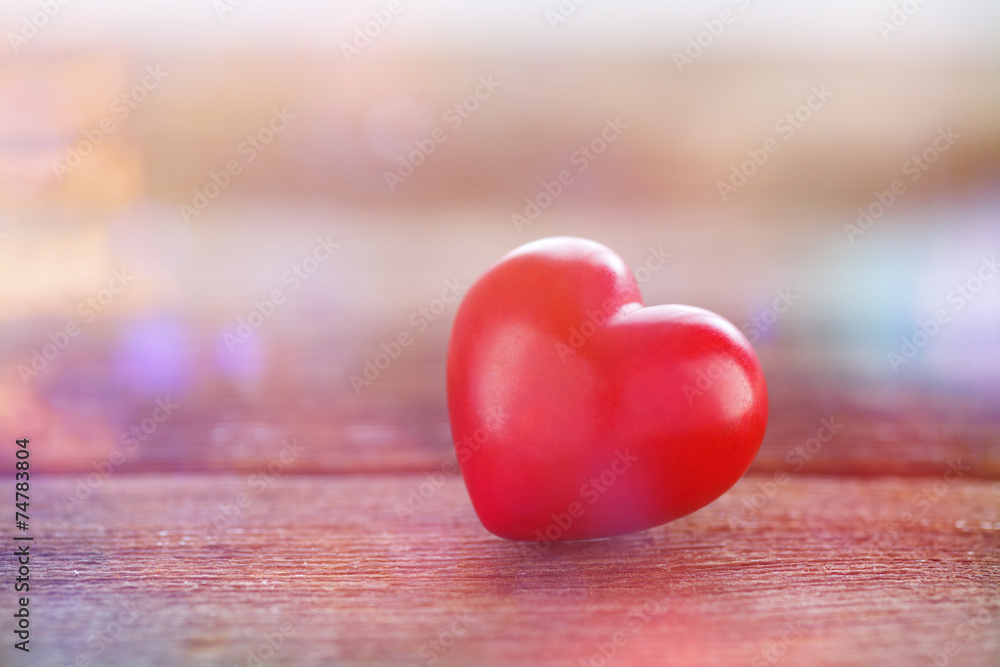 red heart on wooden board red heart on wooden board