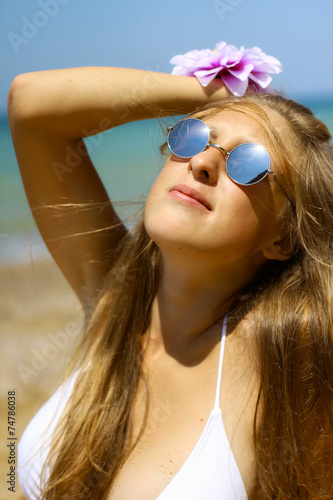 beautiful girl in sunglasses posing on the beach © komi$ar
