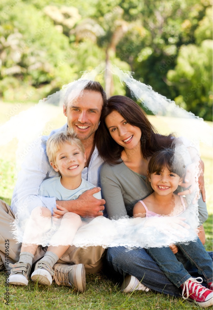 Composite image of family sitting in the park Composite image of family sitting in the park