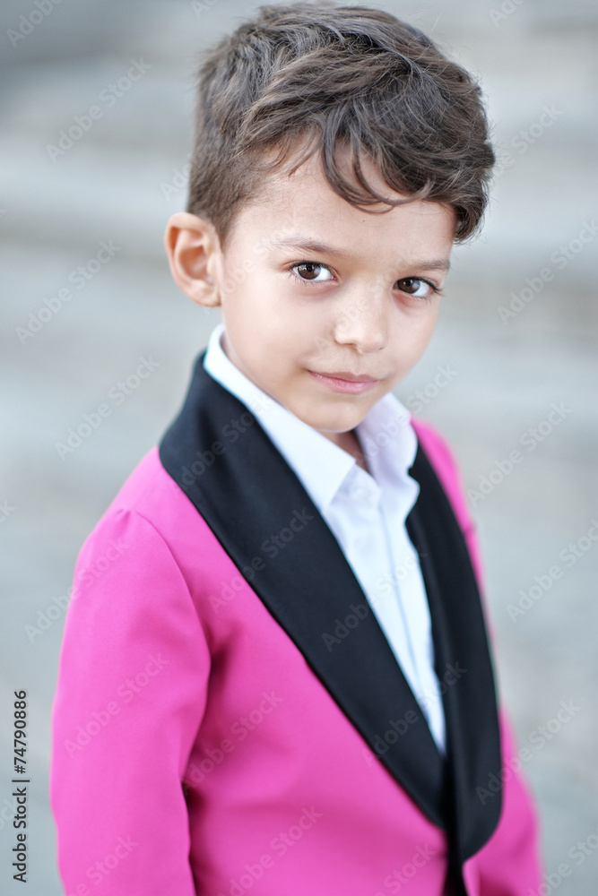 portrait of a little boy in a business style portrait of a little boy in a business style