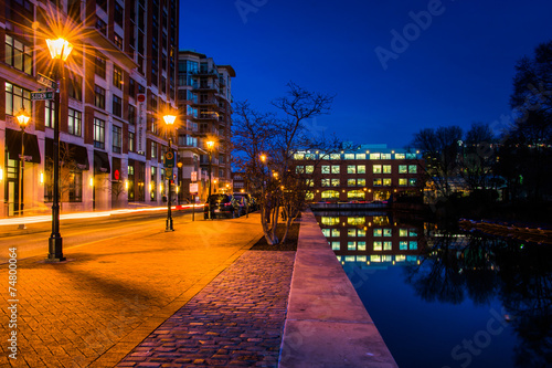 Canal along a street at night in Baltimore, Maryland.