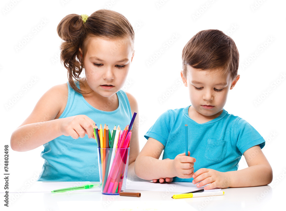 Little children is drawing on white paper Little children is drawing on white paper