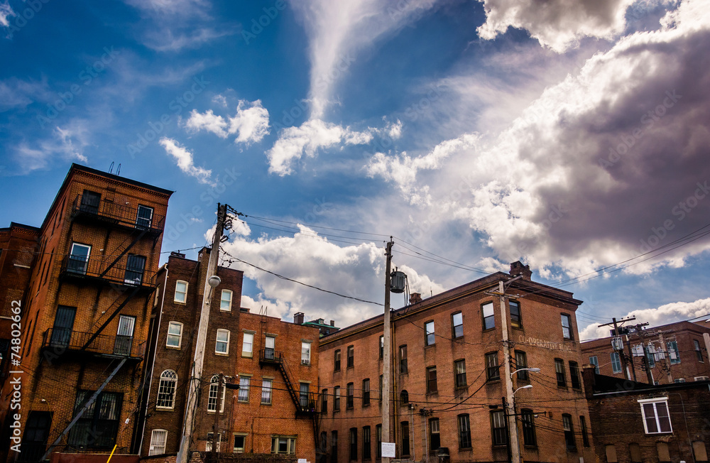 Dramatic sky over old buildings in Baltimore, Maryland.