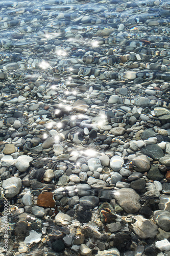 Gravel stones at the sea bottom.