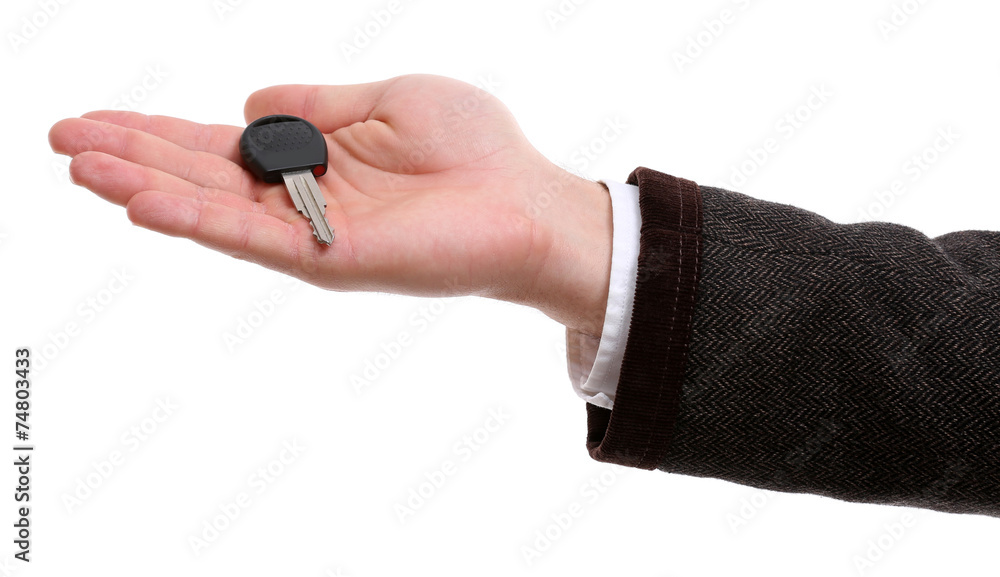 Businessman holding car key isolated on white Businessman holding car key isolated on white