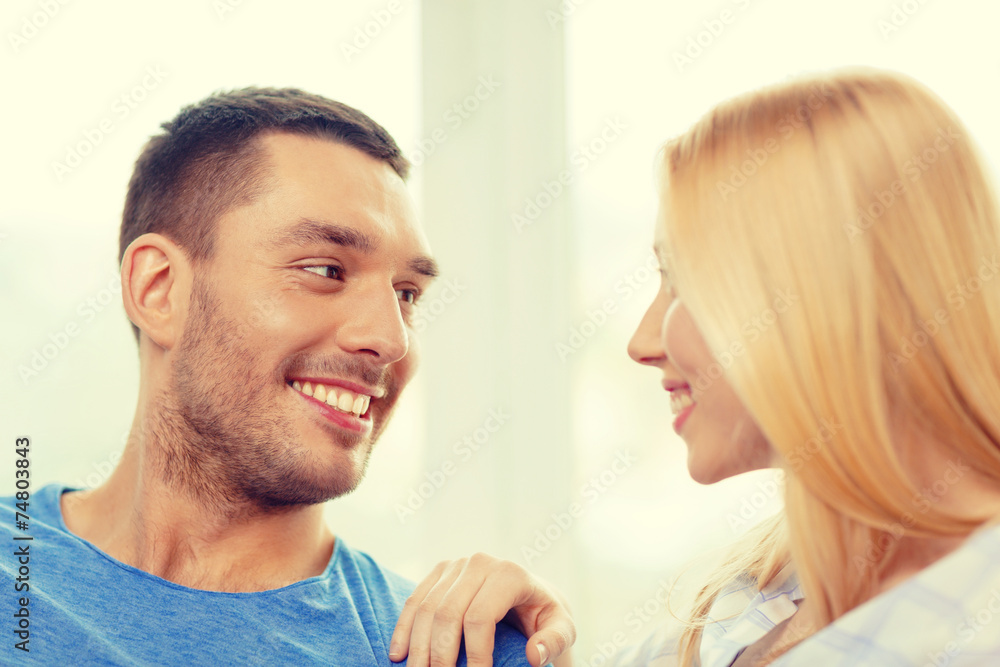 smiling happy couple at home smiling happy couple at home