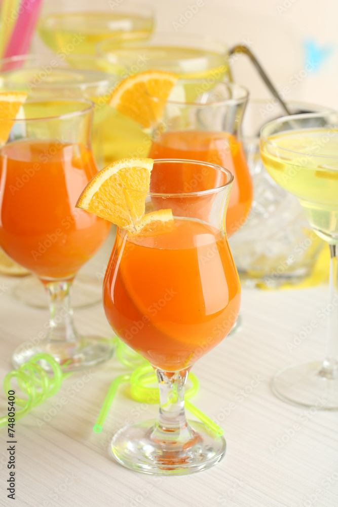 Glasses of fruit cocktails in party close-up