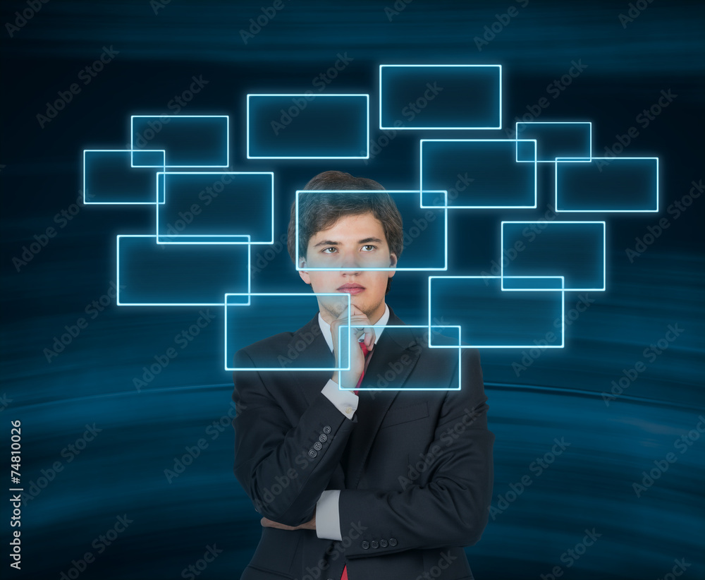 businessman looking to screen businessman looking to screen
