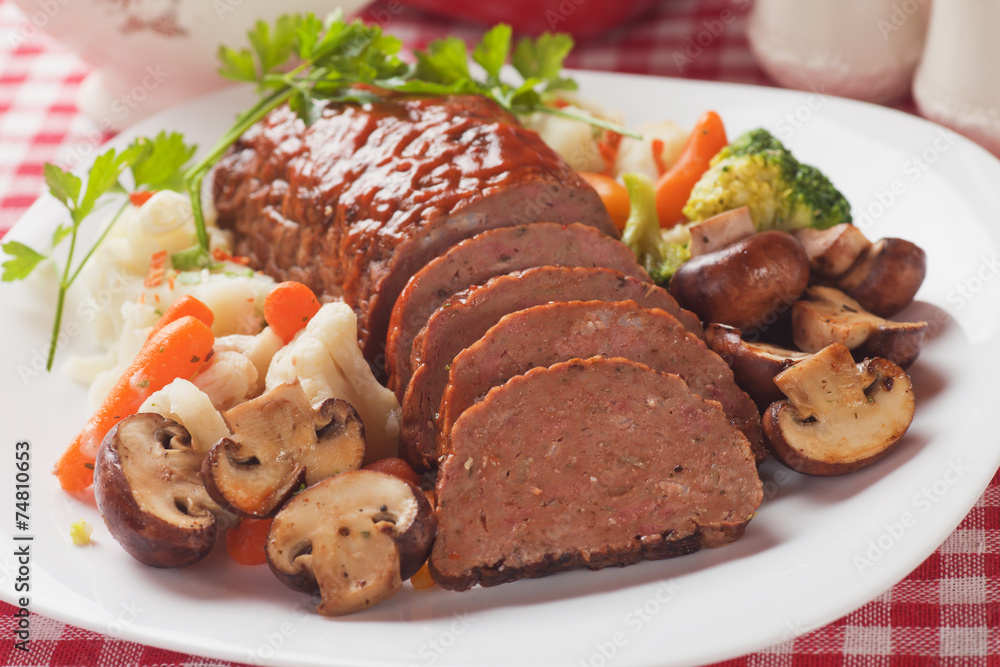 Classic meatloaf with mushrooms and vegetables