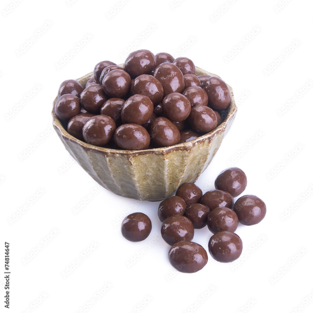 chocolate balls. chocolate balls in bowl on a background chocolate balls. chocolate balls in bowl on a background