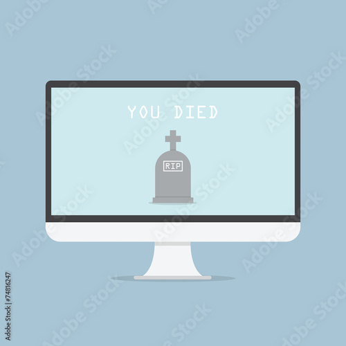 Computer monitor with grave and text YOU DIED