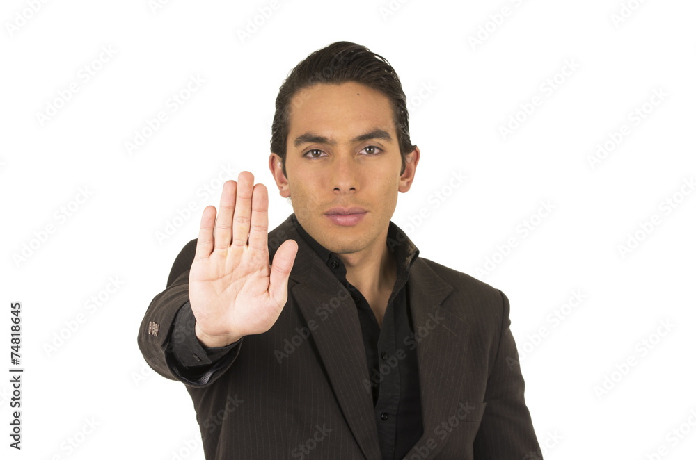 handsome young man wearing a suit posing gesturing stop handsome young man wearing a suit posing gesturing stop