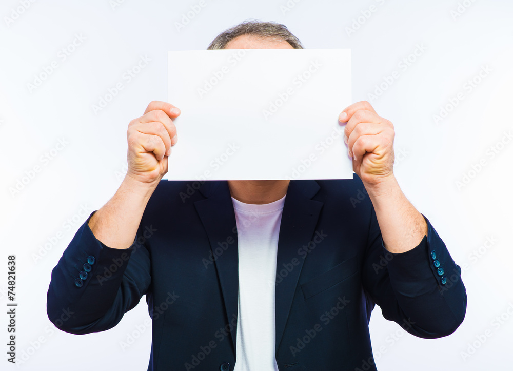 Businessman showing the big blank card in hand Businessman showing the big blank card in hand