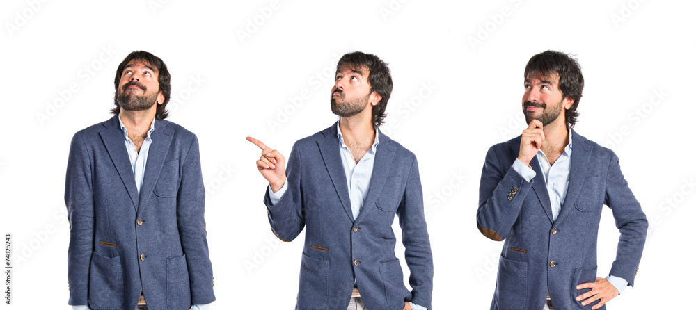 Businessman thinking over isolated white background Businessman thinking over isolated white background
