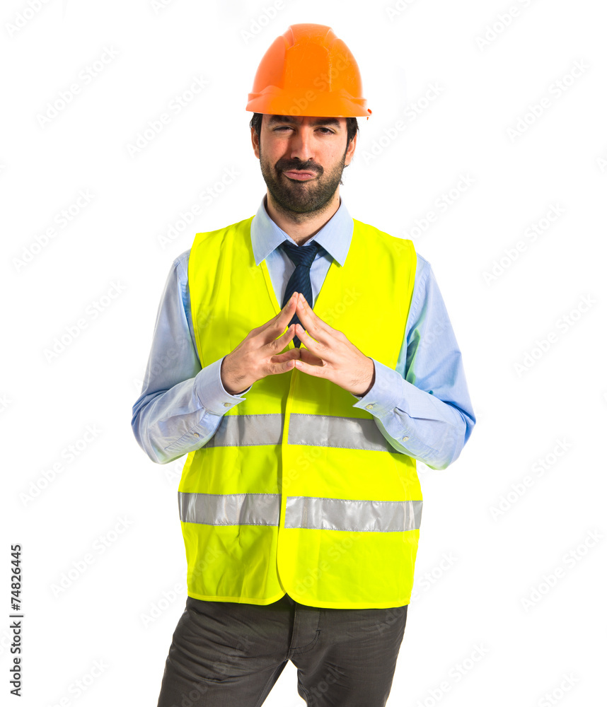 worker thinking over white background worker thinking over white background