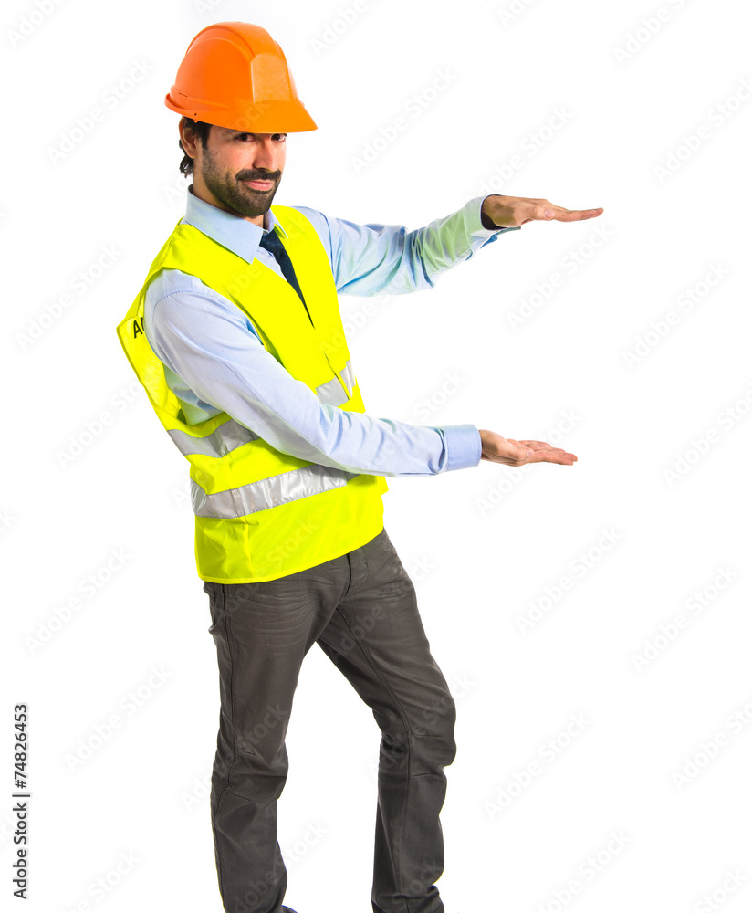 workman holding something over white background workman holding something over white background
