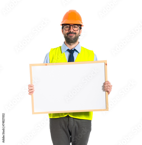 Workman holding empty placard