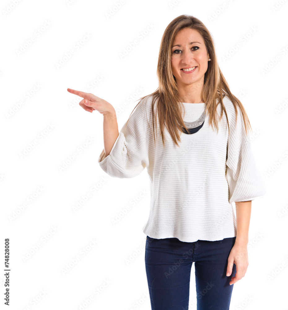 Woman pointing to the lateral Woman pointing to the lateral