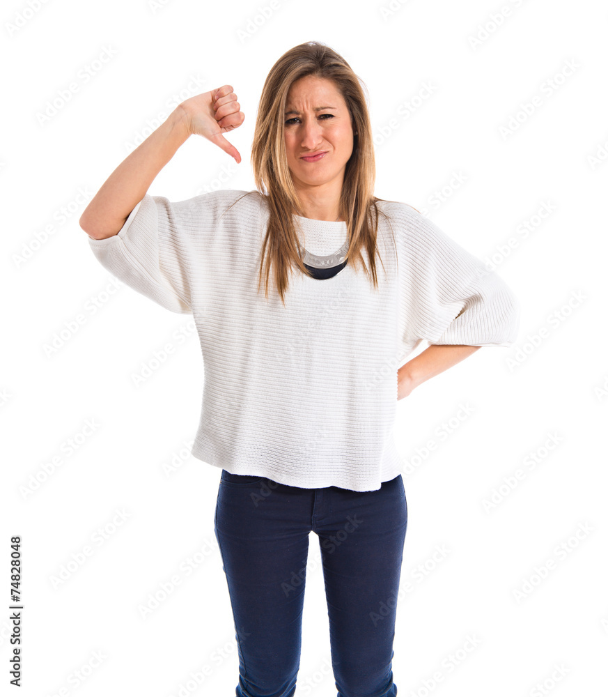 Woman doing a bad signal Woman doing a bad signal