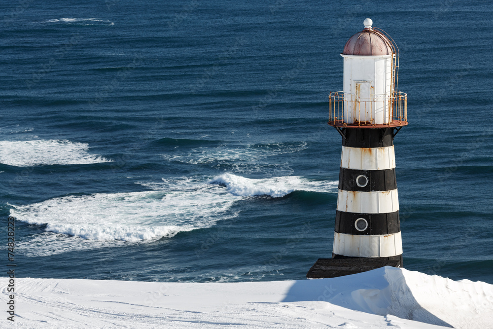 Lighthouse on coast of Pacific Ocean. Petropavlovsk-Kamchatsky Lighthouse on coast of Pacific Ocean. Petropavlovsk-Kamchatsky