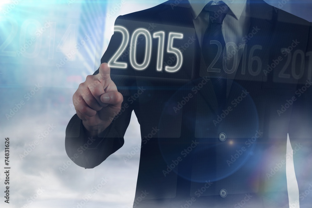 Composite image of businessman in suit pointing finger Composite image of businessman in suit pointing finger