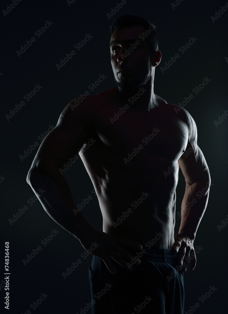 Silhouette of a handsome muscular man Silhouette of a handsome muscular man