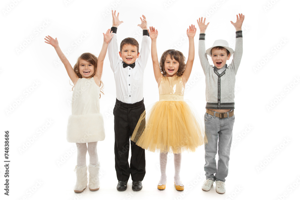 Obraz premium Group of happy kids in celebratory clothes.