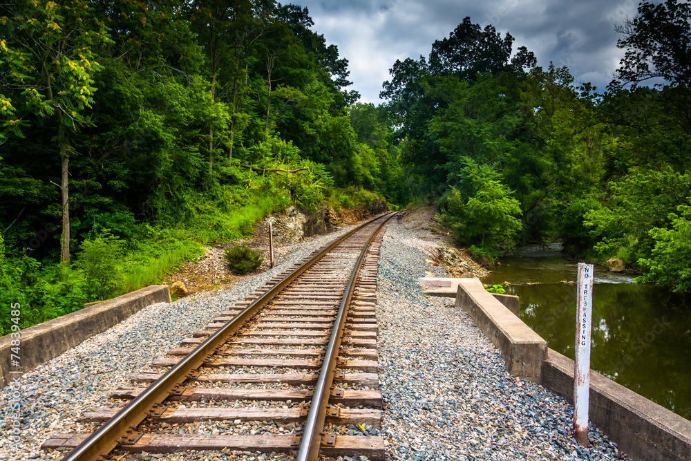 Railroad track along a creek in rural Carroll County, Maryland.