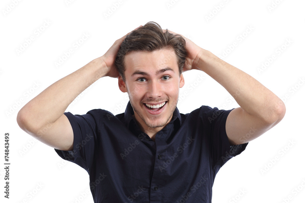 Surprised happy man smiling with hands on head Surprised happy man smiling with hands on head