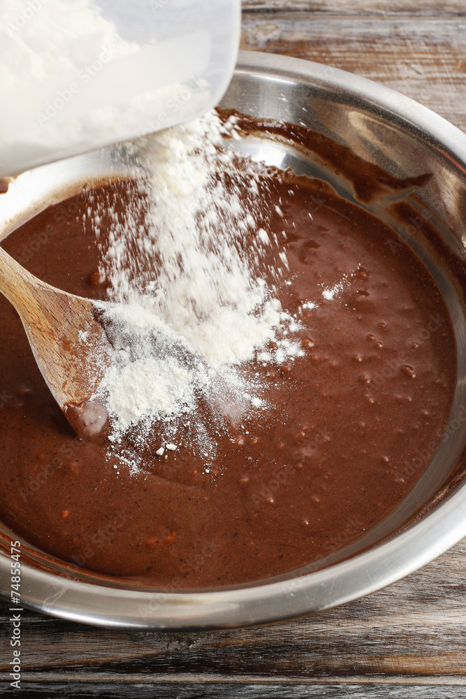 Steps of making chocolate cake : mixing ingredients Steps of making chocolate cake : mixing ingredients