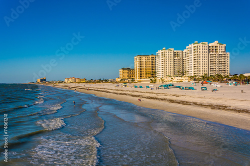 View of beachfront hotels and the beach from the fishing pier in