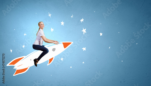 Woman riding rocket