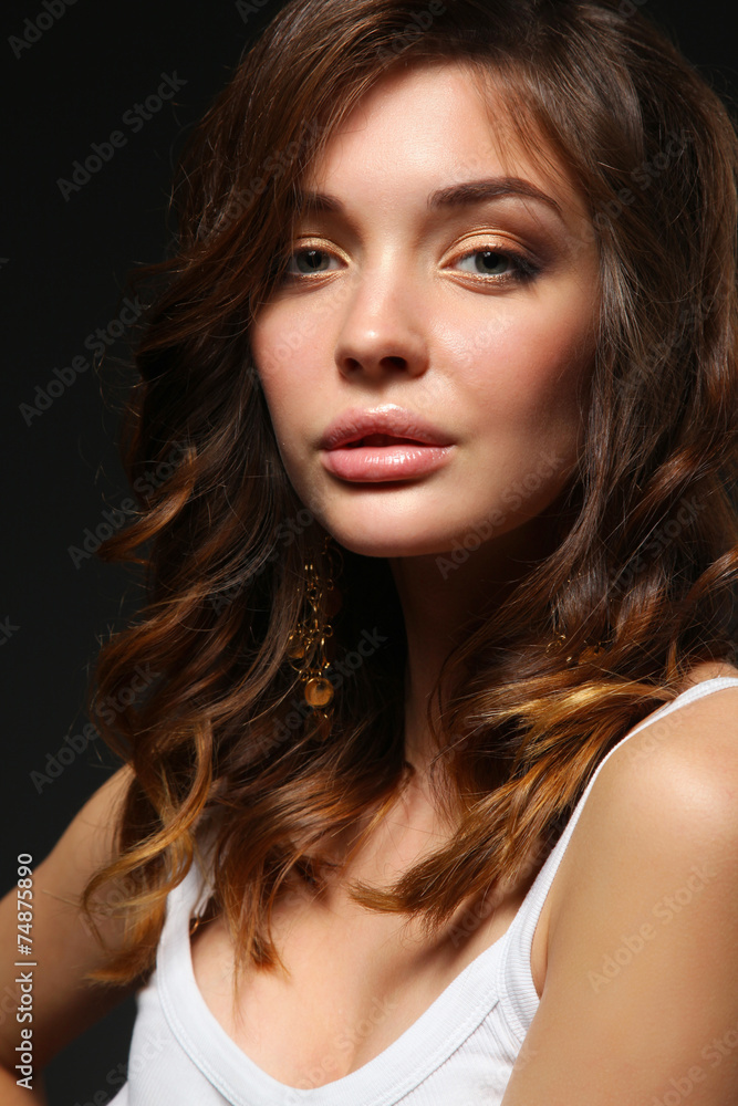 Fototapeta premium Close up portrait of beautiful young woman face. Isolated on